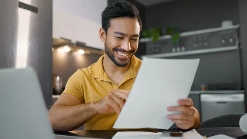 Smiling professional holding document